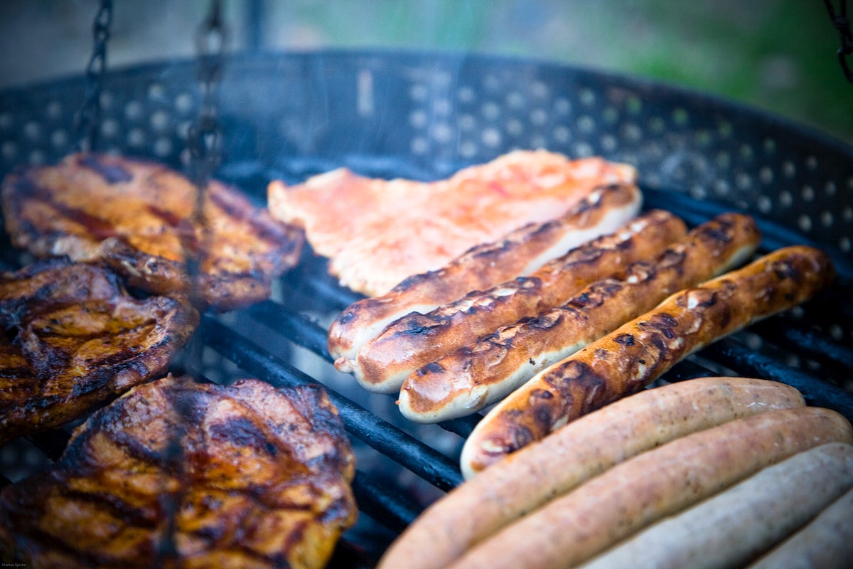 Sausages and meat on the grill