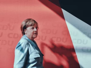 Merkel schlägt mit dem Holzhammer auf Friedrich Merz